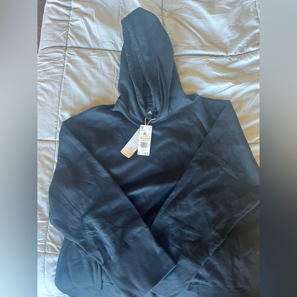 Multi Sport NEW Adidas sweatshirt. Size XL Never worn + still has tags